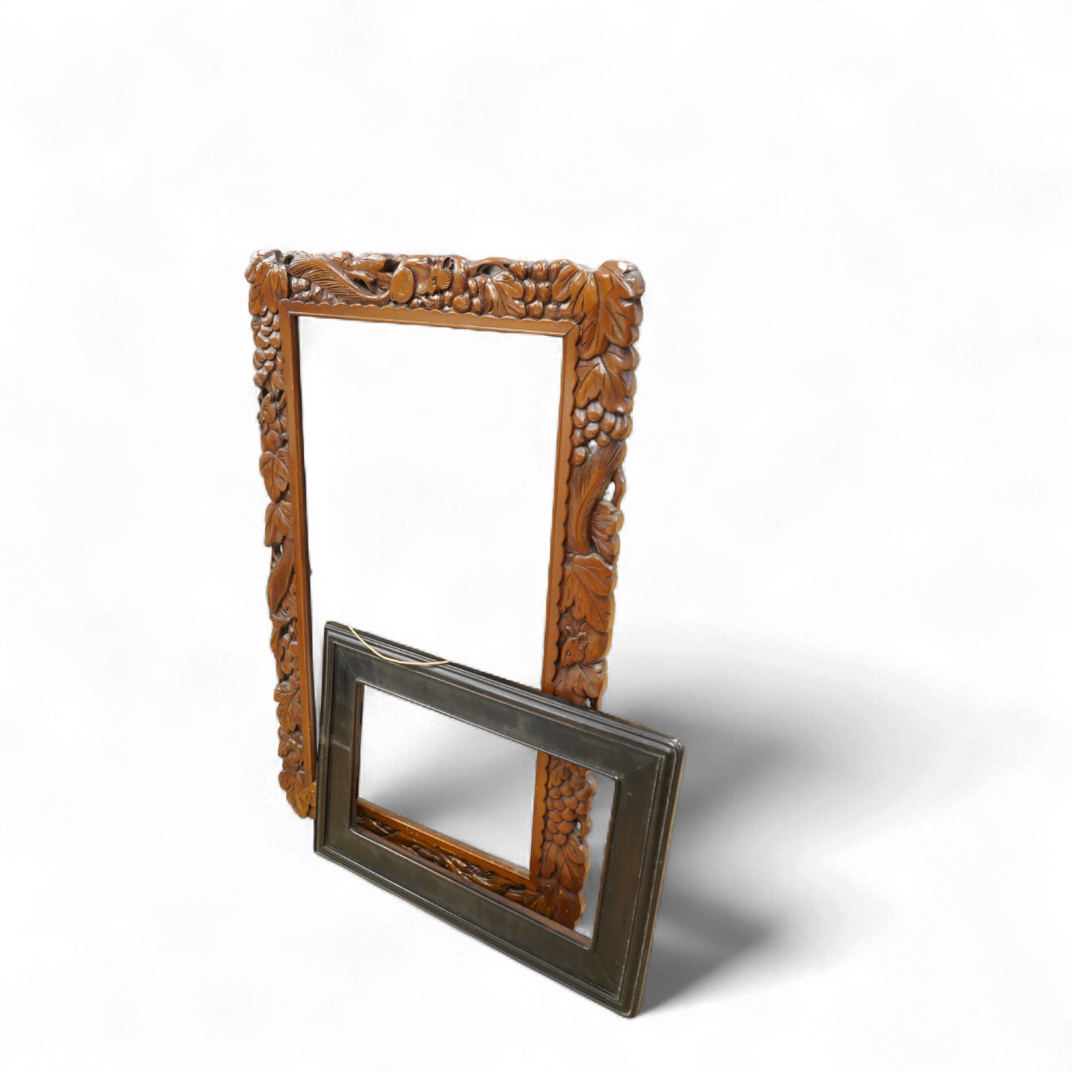 Two picture frames to include a carved wood example, aperture size 74 x 41cm